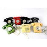 An assorted collection of telephones to include a green BT 8746, a black BT 706, a black GEC 746,