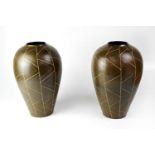 DENBY; a pair of vases of bulbous tapering form with incised triangular and linear decoration on a