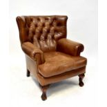 A mid-20th century conker brown leather Chesterfield wing back chair to cabriole supports.
