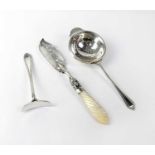 A hallmarked silver tea strainer, pusher and mother of pearl handled fish knife, various marks,