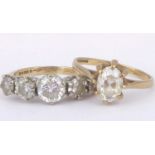Two 9ct gold dress rings including one with a single marquise cut white stone, size L, the other