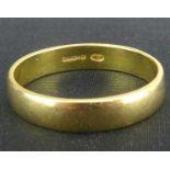 An 18ct gold band ring, size S, approx. 4.2g.