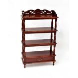 A reproduction four-tier whatnot with pierced three-quarter gallery top, with turned uprights,