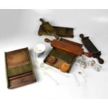 Three vintage mahogany and brass pill moulds and a small quantity of pharmaceutical items to include