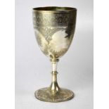 RICHARDS & BROWN; a Victorian hallmarked silver trophy with engraved decoration of ferns and