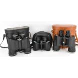 Three pairs of modern cased binoculars to include Halina Sightsetter 16 x 50, Tasco fully coated 8 x