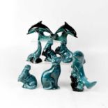 POOLE POTTERY; eight models of animals in blue and black colourway, comprising cat, sea lion,