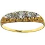 An 18ct gold diamond ring set with five graduated tiny diamonds, total approx. 0.07ct, size Q,