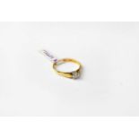 An 18ct gold solitaire diamond ring, stamped 18, size N 1/2, approx. 2.5g.