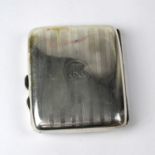 A hallmarked silver engine turned cigarette case with monogrammed cartouche, approx. 3ozt.