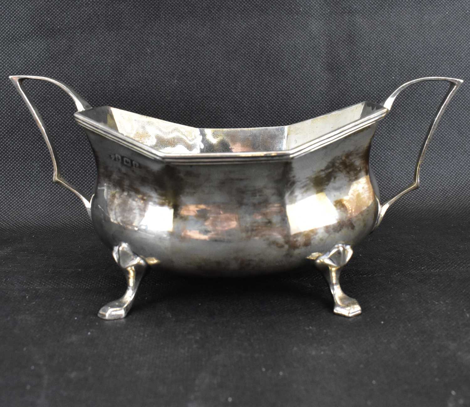 A George V hallmarked silver three-piece tea service with ebonised handle and knop, raised on four - Image 5 of 5