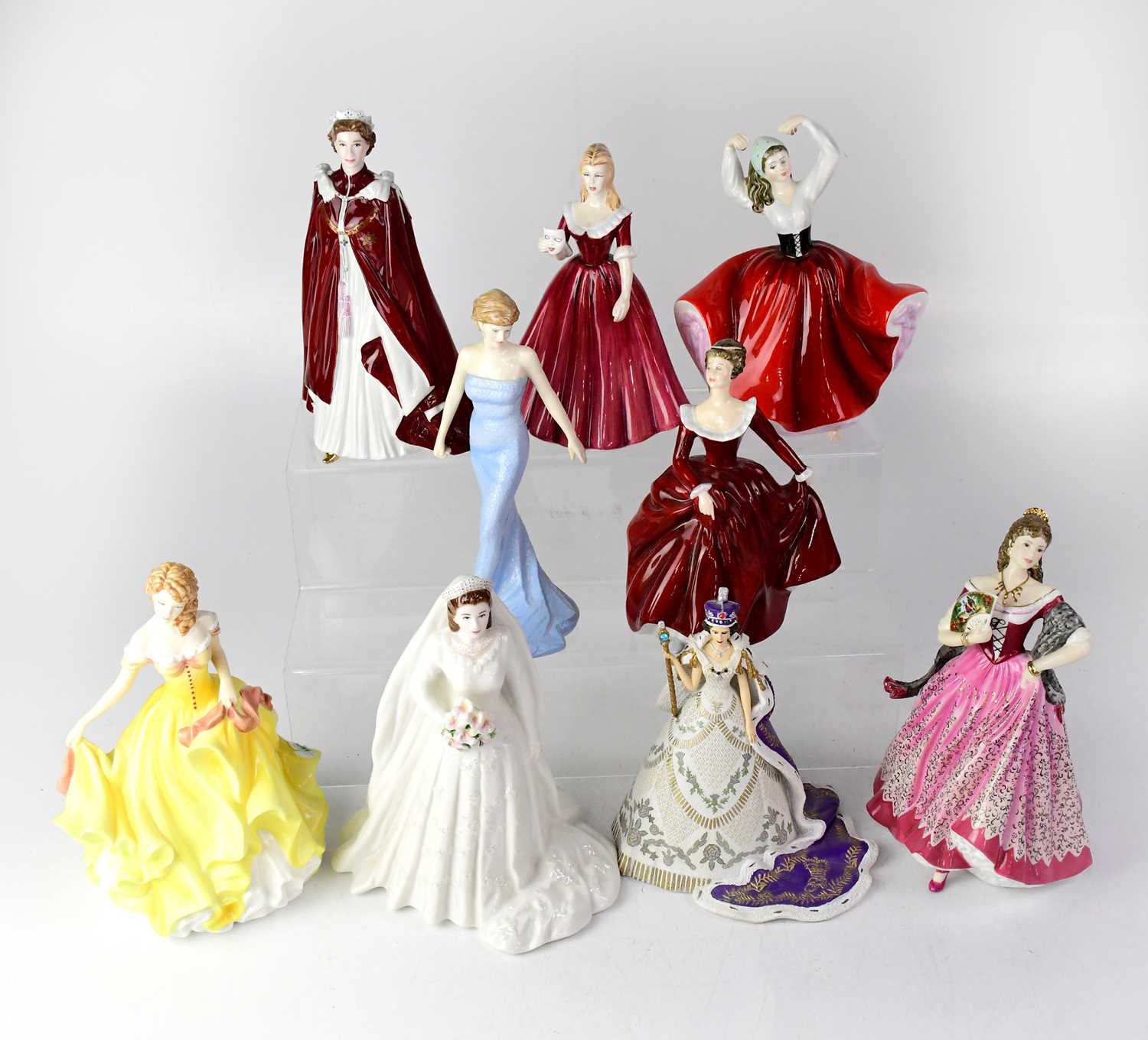Eight porcelain figures of ladies, Royal Worcester, Royal Doulton and Royal Grafton, together with a