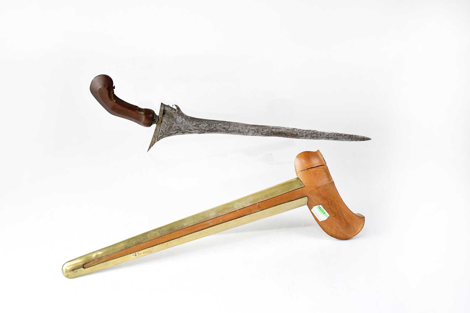 A late 18th/early 19th century Eastern Kris with carved shaped wooden handle and brass bound - Image 2 of 3