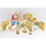 ENESCO LTD; five boxed 'The World of Beatrix Potter' items comprising three picture frames, a figure