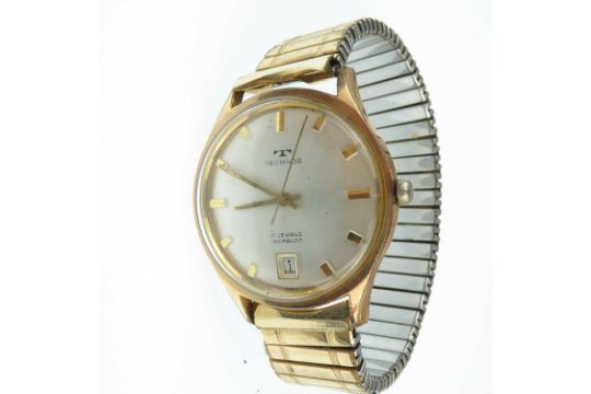 TECHNOS; a gentlemen's gold plated wristwatch, the silvered dial set with raised baton numerals - Image 1 of 3