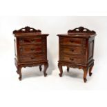 A pair of reproduction carved mahogany serpentine front three-drawer bedside cabinets with shaped