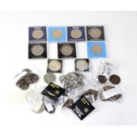 A collection of UK and world coinage to include commemorative examples and crowns.