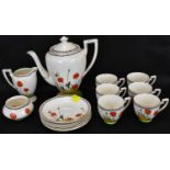 CROWN DUCAL; a fifteen-piece coffee set decorated with 'Poppies' design, height of teapot 17cm (