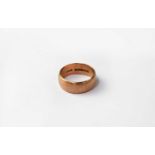 A 9ct brushed rose gold wedding band, size V, approx. 8.2g (af).Condition Report: Ring has been cut