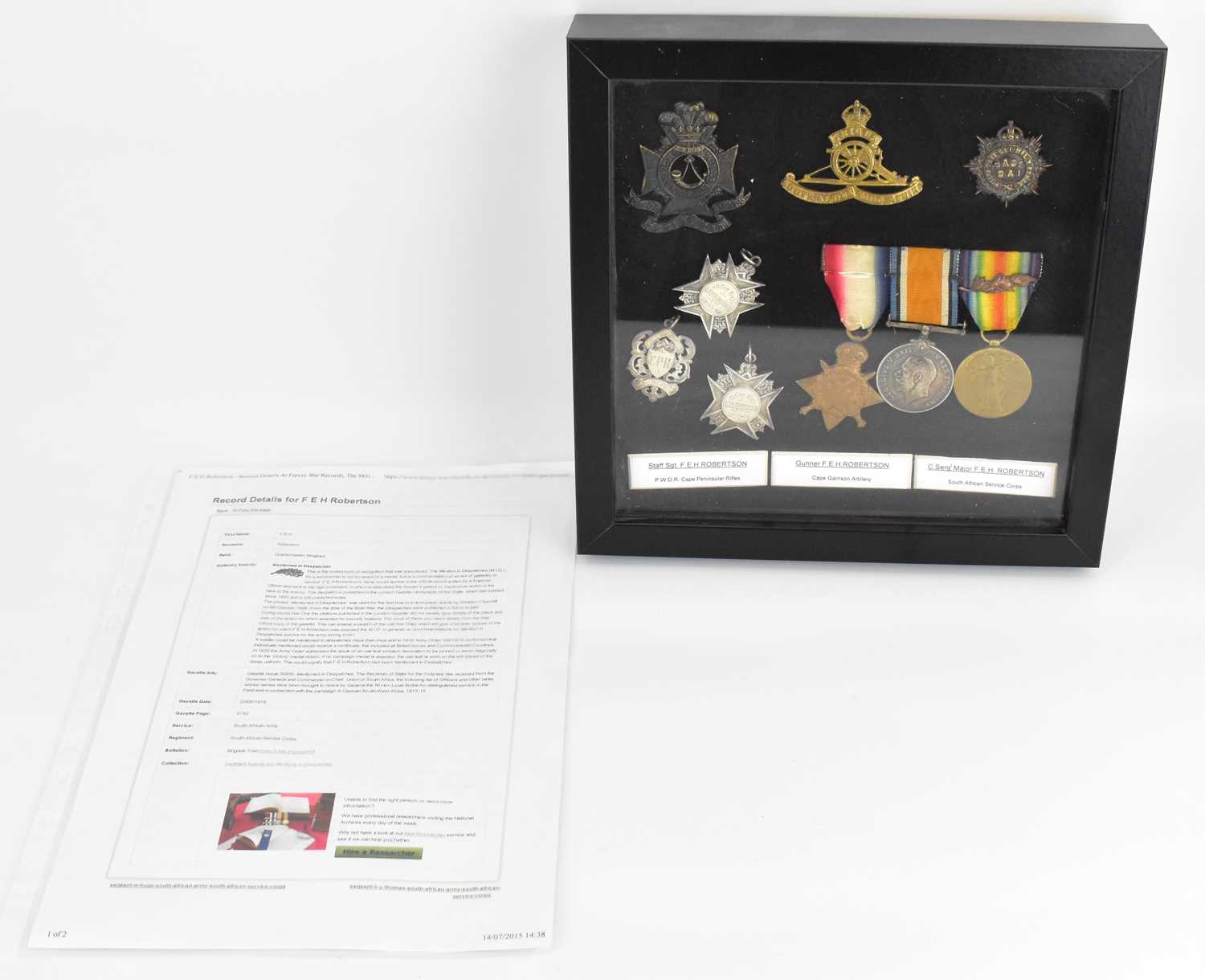 SOUTH AFRICAN CAMPAIGN; a framed display of medals to include Defence, War and 1914-15 Star, cap