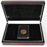 A Victorian 1898 old head sovereign, Melbourne Mint, in clear tablet in presentation wooden box,