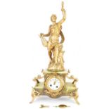 An early 20th century French onyx clock with gilt figures of Apollo, marked for Bruchon, onyx