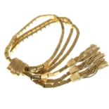 A fancy 18ct gold bracelet of three strands of box links, with an up-and-over gold box clasp and