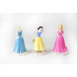 ROYAL DOULTON; three Walt Disney Showcase Collection figures, DP5 'Snow White', DP1 'Cinderella',
