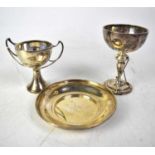 Two hallmarked silver trophies comprising a golfing trophy inscribed ‘Baildon Golf Club Cup 1924