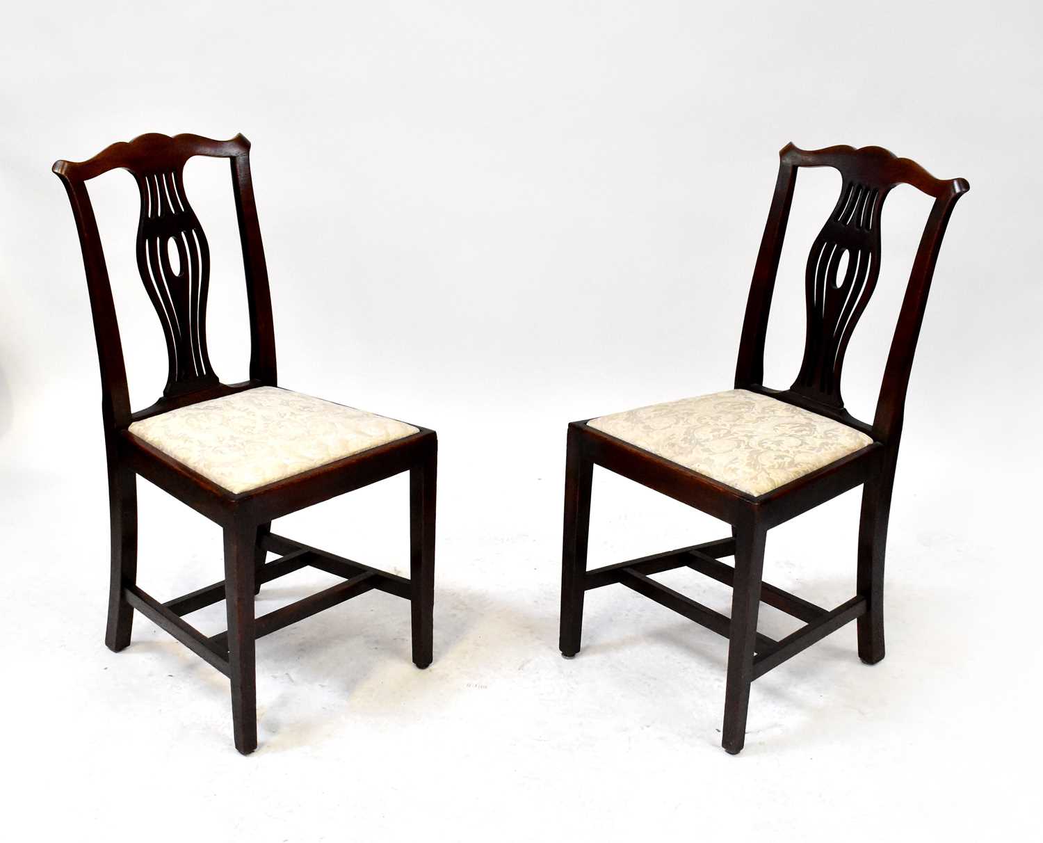 Four 19th century oak dining chairs with drop-in upholstered seats, double cross supports and square