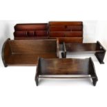 Three vintage wooden book troughs, height of largest 23cm, length 52cm, height of smallest 15cm,