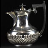 A George V hallmarked silver teapot with ebony handle and knop, Viners Ltd, height 23cm, approx.