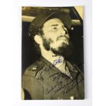 FIDEL CASTRO; a black and white photograph bearing his signature, 15 x 10cm.Condition Report: We