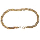 A two-colour 9ct gold flat strand bracelet, length 18cm, approx. 3g.