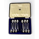 A cased set of twelve Elizabeth II hallmarked silver teaspoons and sugar tongs, Walker & Hall,