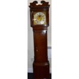 THOMAS KNOWLES; an 18th century thirty hour oak longcase clock, the silvered chapter ring set with