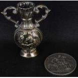A miniature Chinese hallmarked silver posy vase, with characters to the front and back and Chinese
