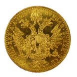 FRANZ JOSEPH I, 1915; an Austria one ducat gold (.986 grade) coin, approx. 3.5g.