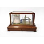 CASELLA, LONDON; a mahogany cased barograph with base drawer and bevel edged glass, 23 x 37 x 23cm.