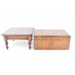 A small 19th century mahogany stool with inner sewing compartment, raised on tapered turned