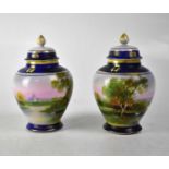 A pair of 20th century Noritake baluster ginger jars with hand painted scenic lake decoration and