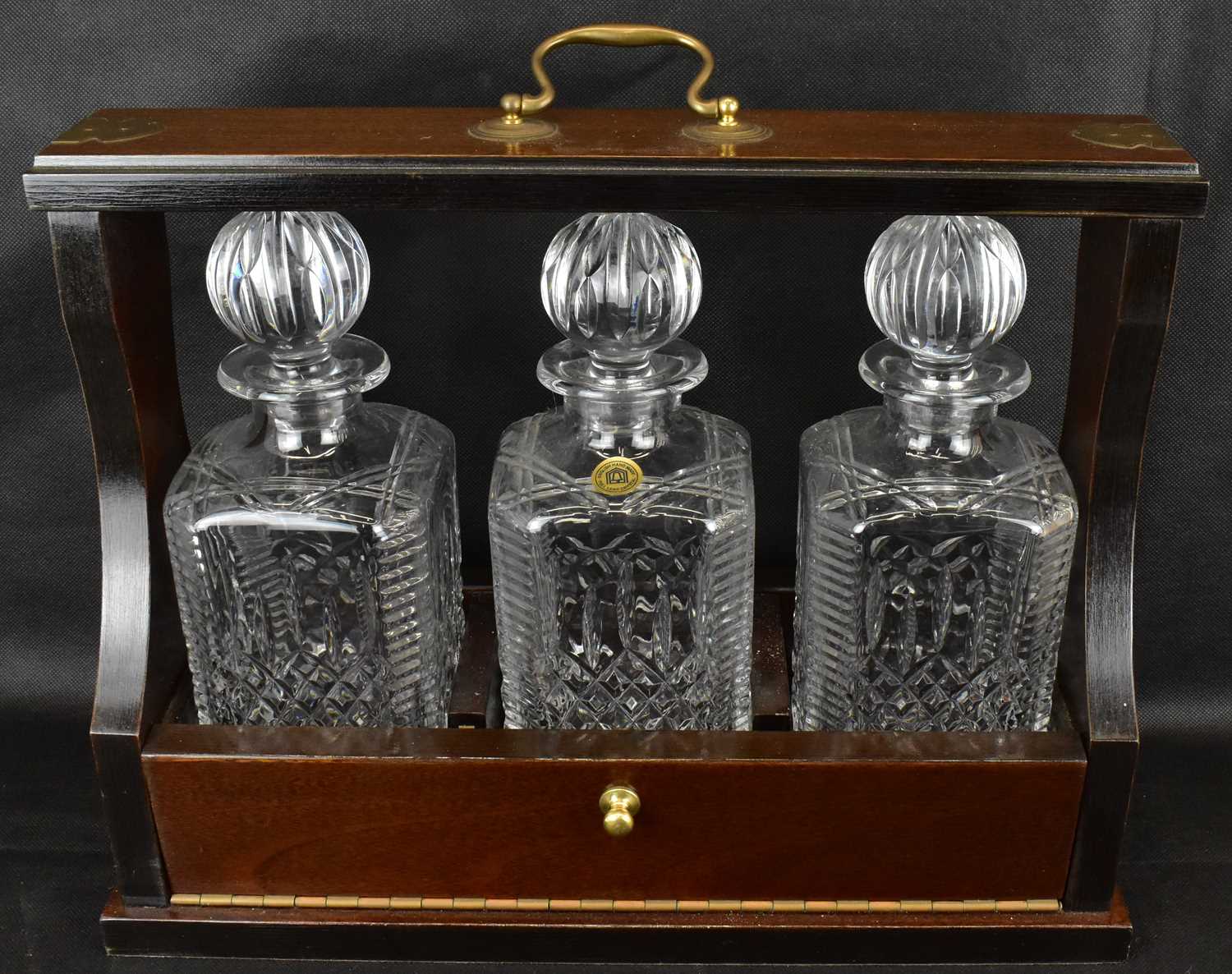 A 20th century mahogany cased three-decanter tantalus, the matching three square English hand made - Image 2 of 4