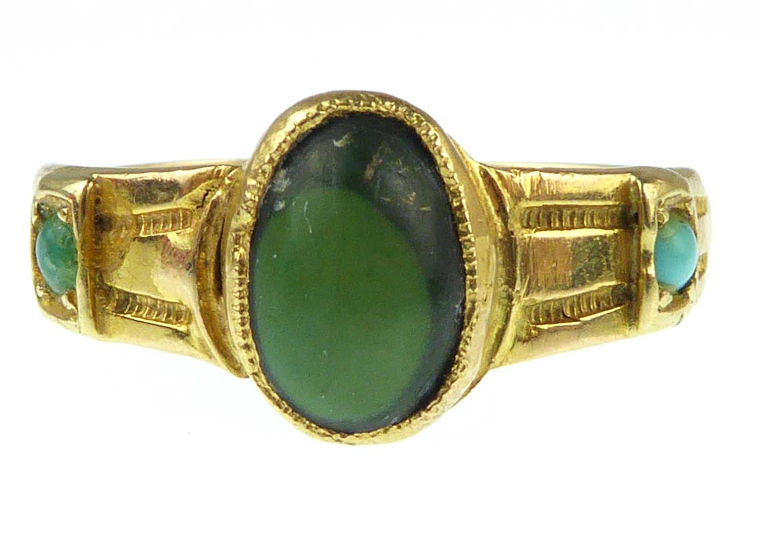 A late 19th/early 20th century 15ct gold turquoise and bezel set green stone ring, size K, approx.