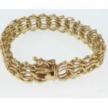 A 14ct gold multiple circle link bracelet with box safety clasp, length 20cm, approx. 29.6g.