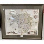 A hand coloured map of North Wales, 41 x 52cm, framed and glazed.