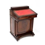 A reproduction mahogany Davenport desk with gilt tooled red leather panel to the sloping front, 87 x