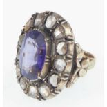 A 19th century gold diamond and sapphire ring, the central marquise cut stone 0.95 x 1.16cm,