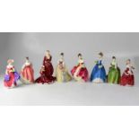 ROYAL DOULTON; eight figures comprising 'Mistletoe & Wine' limited edition no.175/7500, HN2368 '