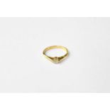 An 18ct gold solitaire diamond ring, stamped 750, size O, approx. 2.6g.