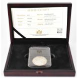 An Edward VII 1902 silver crown, encapsulated in tablet, in presentation box, with certificate.